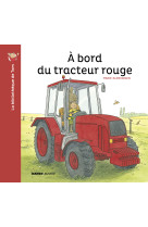 à bord du tracteur rouge